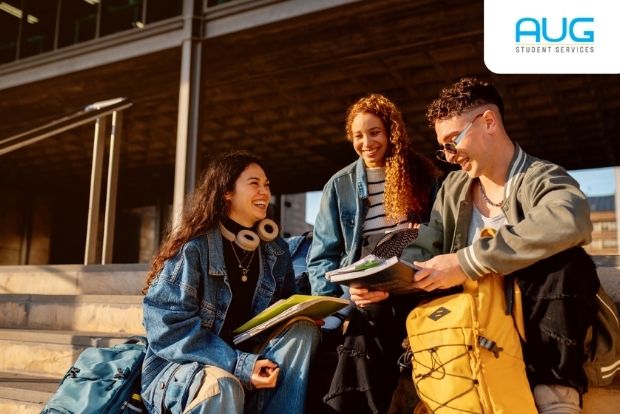 International graduates in gowns celebrating on a UK university campus after qualifying for the UK Graduate Visa