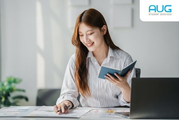 International student holding passport and Australia student visa application documents