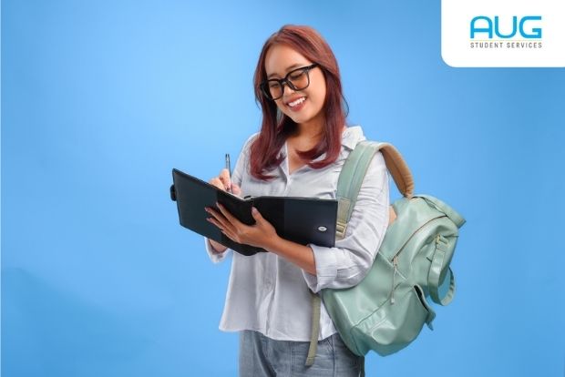 International student holding passport and documents for Australian student visa application